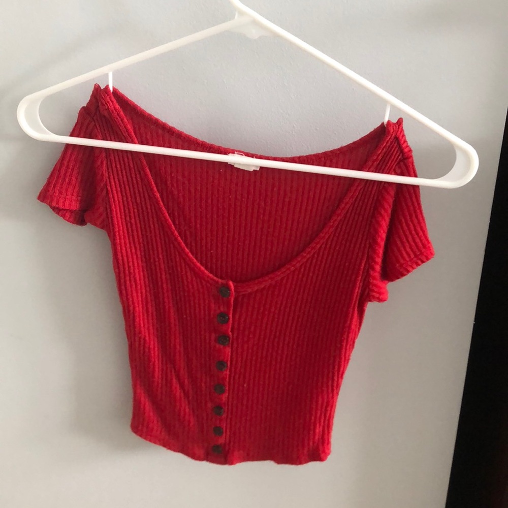 a cropped button down short sleeve shirt